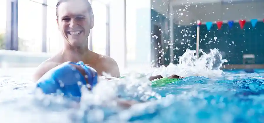 Child with cerebral palsy participating in aquatic therapy, a popular complementary treatment option