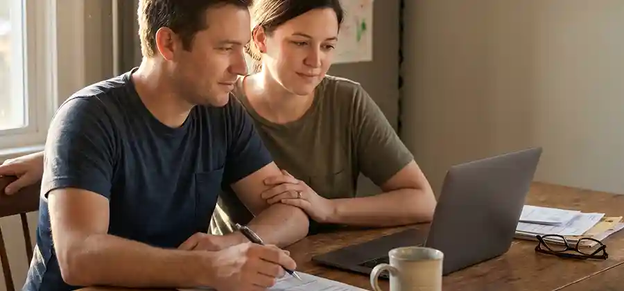 Family reviewing cerebral palsy disability benefits and financial assistance applications