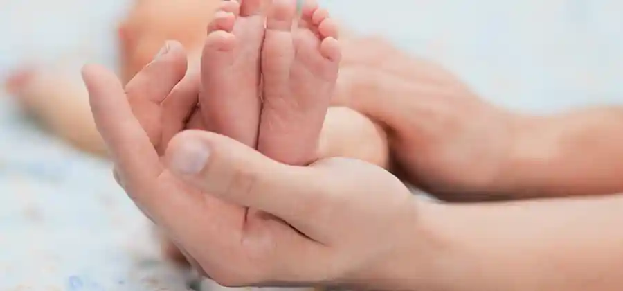 Child with cerebral palsy thriving at home with family support — most children with CP live well into adulthood