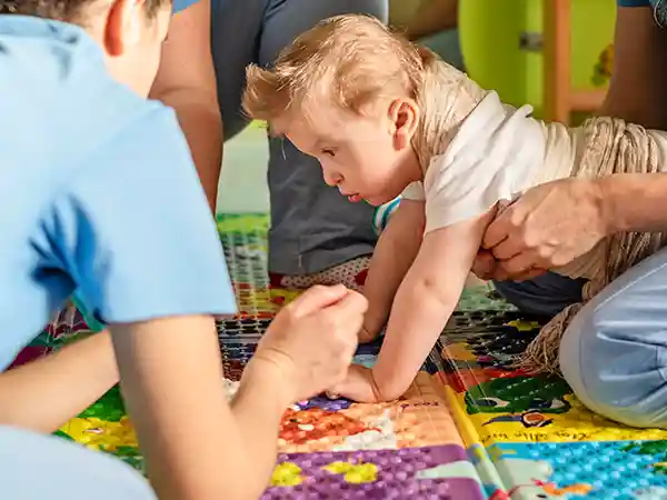 Child with mixed cerebral palsy participating in occupational therapy to improve coordination and daily function